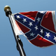 The Confederate flag is seen flying on the grounds of the South Carolina Statehouse in Cplumbia a day after South Carolina Gov. Nikki Haley announced that she will call for the Confederate flag to be removed June 23, 2015.
Joe Raedle/Getty Images